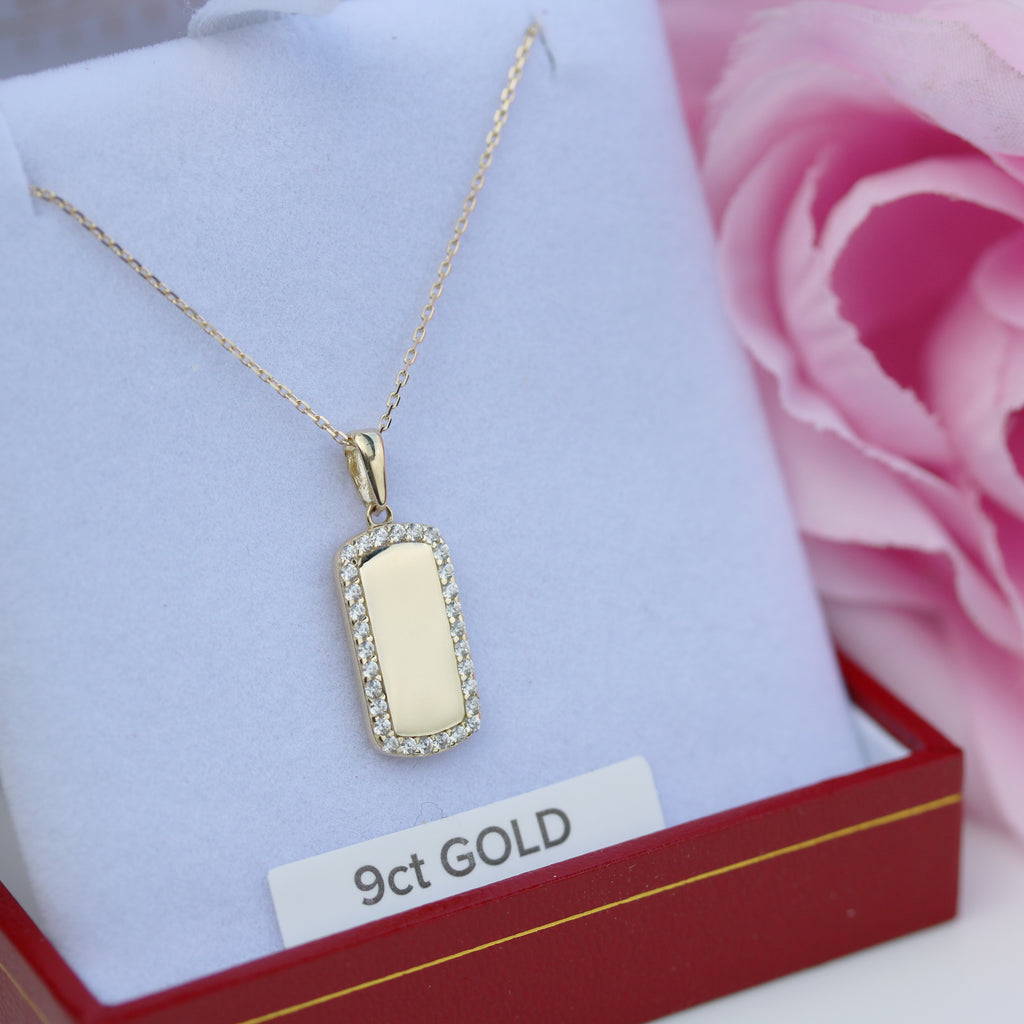 Side view of 9ct gold ladies’ disc pendant and chain, engravable with an initial, available at Gleeson Jewellers.
