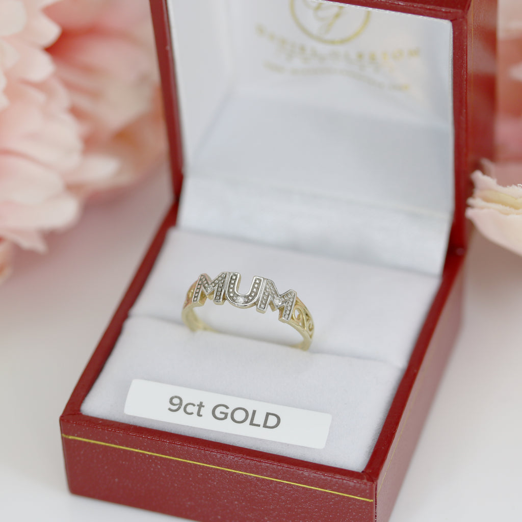 Stunning 9ct Gold Mum Ring with intricate details and sparkling diamonds, resting in a luxurious red and white jewelry gift box.