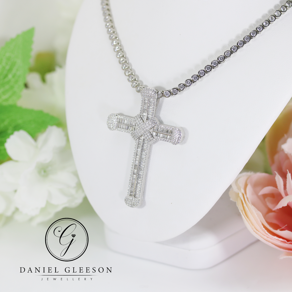 Silver Cross and 17" Tennis chain displayed on a daniel gleeson jewellers cork neck display