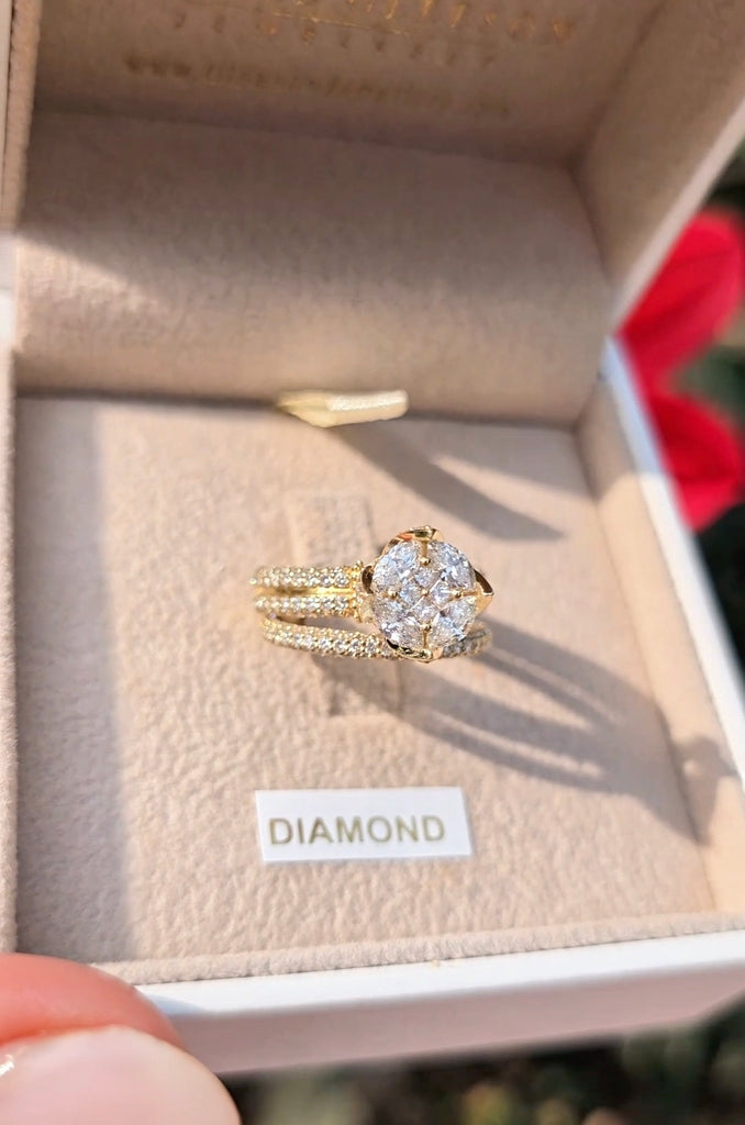 Natural diamond bridal set, Clíona by Gleeson Jewellers, in 14ct yellow gold displayed inside a cream velvet box.