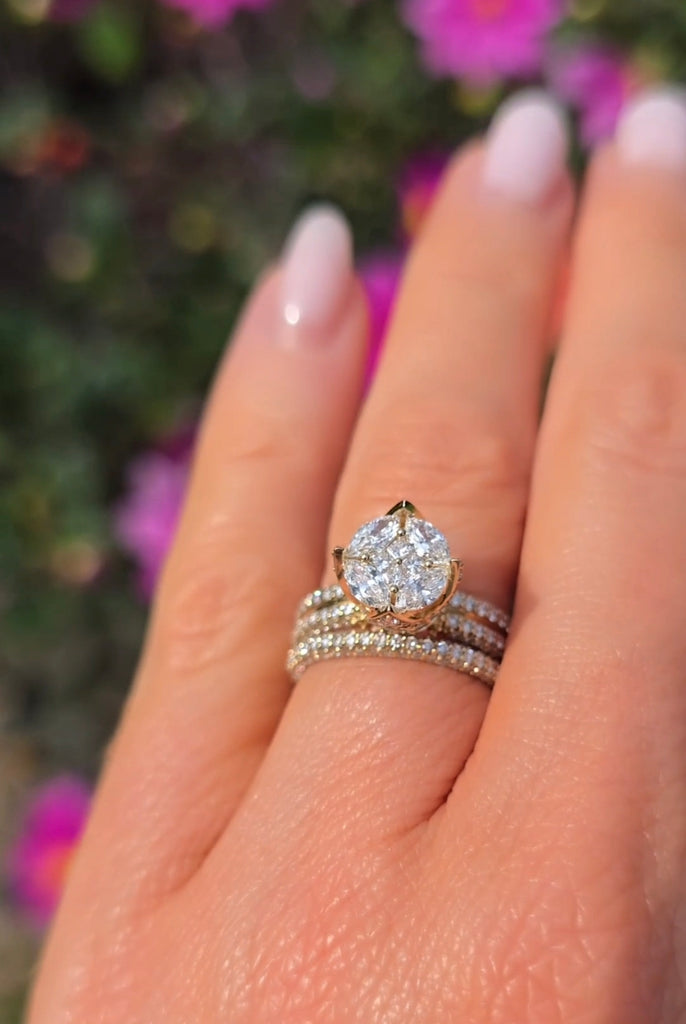Hand modelling the Clíona diamond ring set by Gleeson Jewellers, over two carats of natural diamonds shimmering in the light.