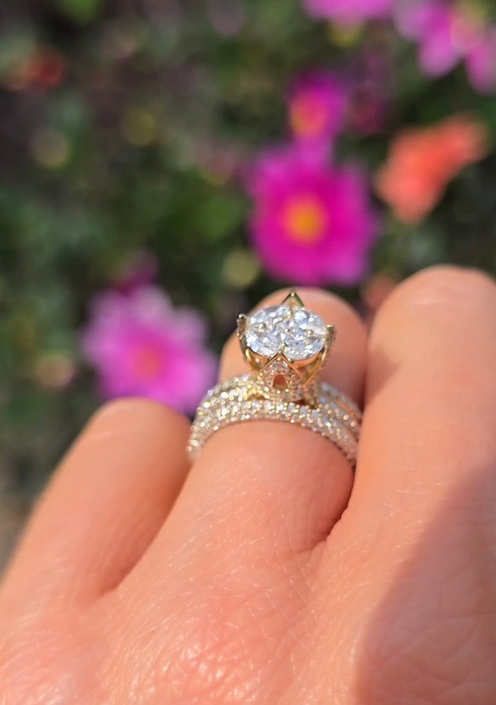 Full hand view showcasing the Clíona 14ct gold natural diamond bridal ring set by Gleeson Jewellers, elegant and sparkling outdoors.