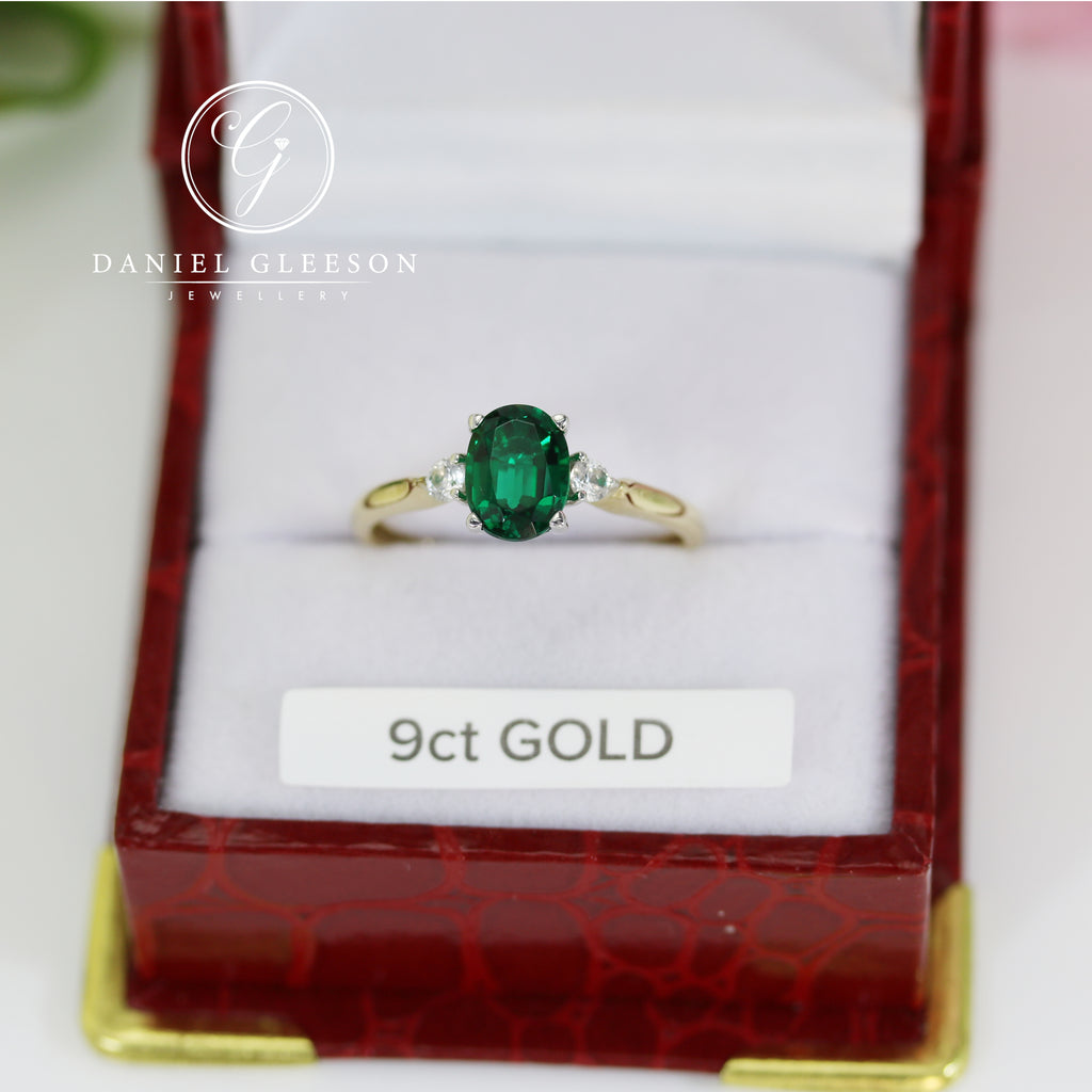 Emerald Ladies three stone 9ct gold dress cocktail ring