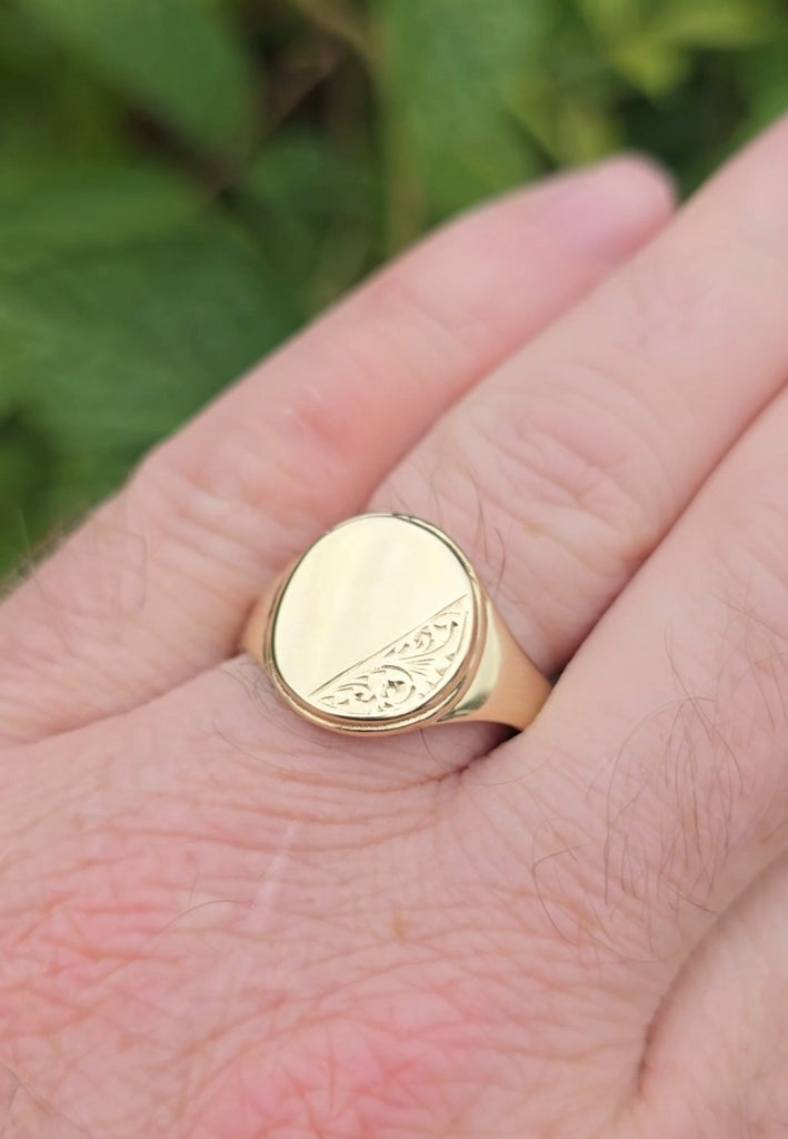 Bold gold signet ring with intricate half-engraving, side view – Gleeson Jewellers
