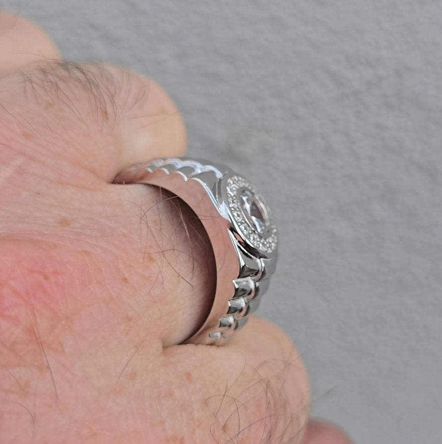 Side profile of sterling silver Rolex-inspired Gleeson Jewellers CZ ring showing thickness of band and bezel-set center stone.

