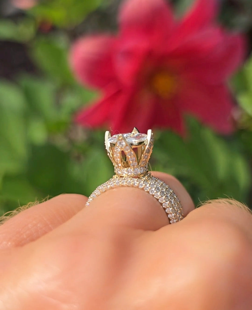 Side view of the Clíona diamond cluster ring from Gleeson Jewellers, highlighting its tall crown-style 14ct yellow gold setting.