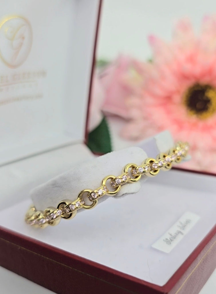 Sterling silver patterned oval link bracelet arranged in a circle inside a Gleeson Jewellery Cork presentation box.