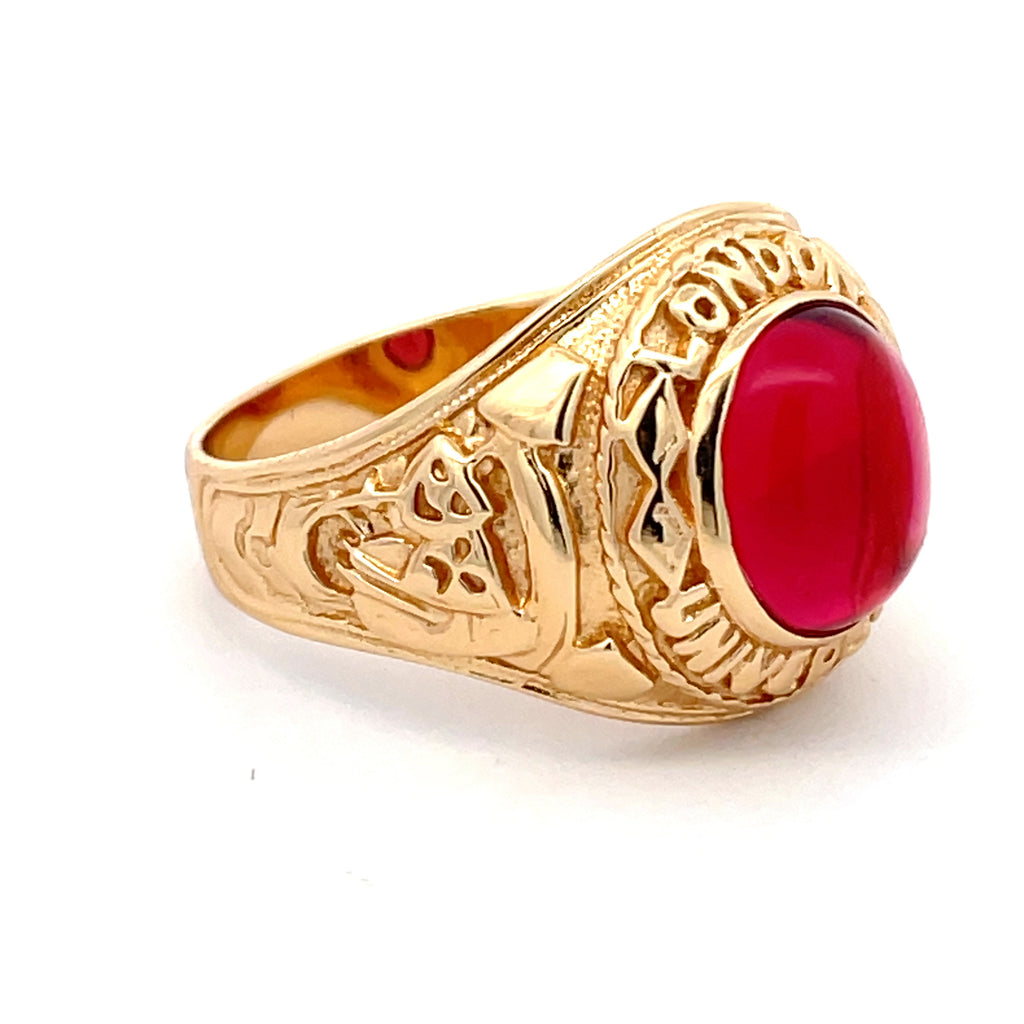 Side view of sterling silver gold-plated men’s college ring featuring bold oval red stone, available at Gleeson Jewellers.
