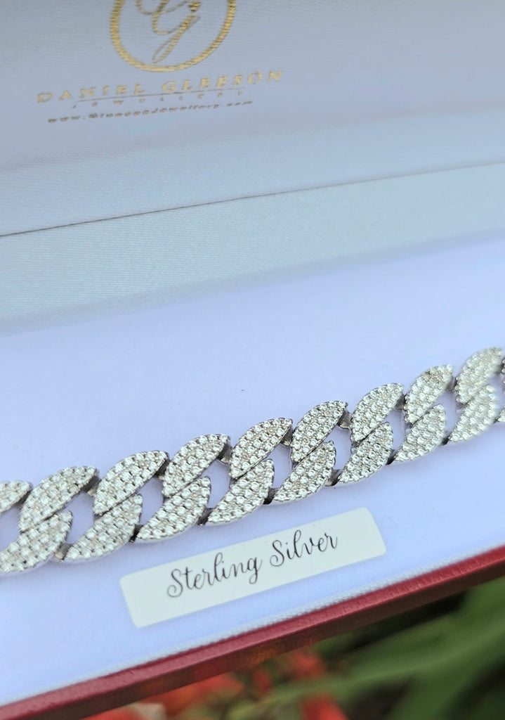 Gleeson Jewellers sterling silver CZ Cuban bracelet displayed in an open red gift box with "Sterling Silver" label.
