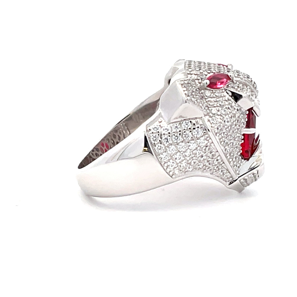 Side view of Sterling Silver panther head ring highlighting sculpted detailing and gemstone features.