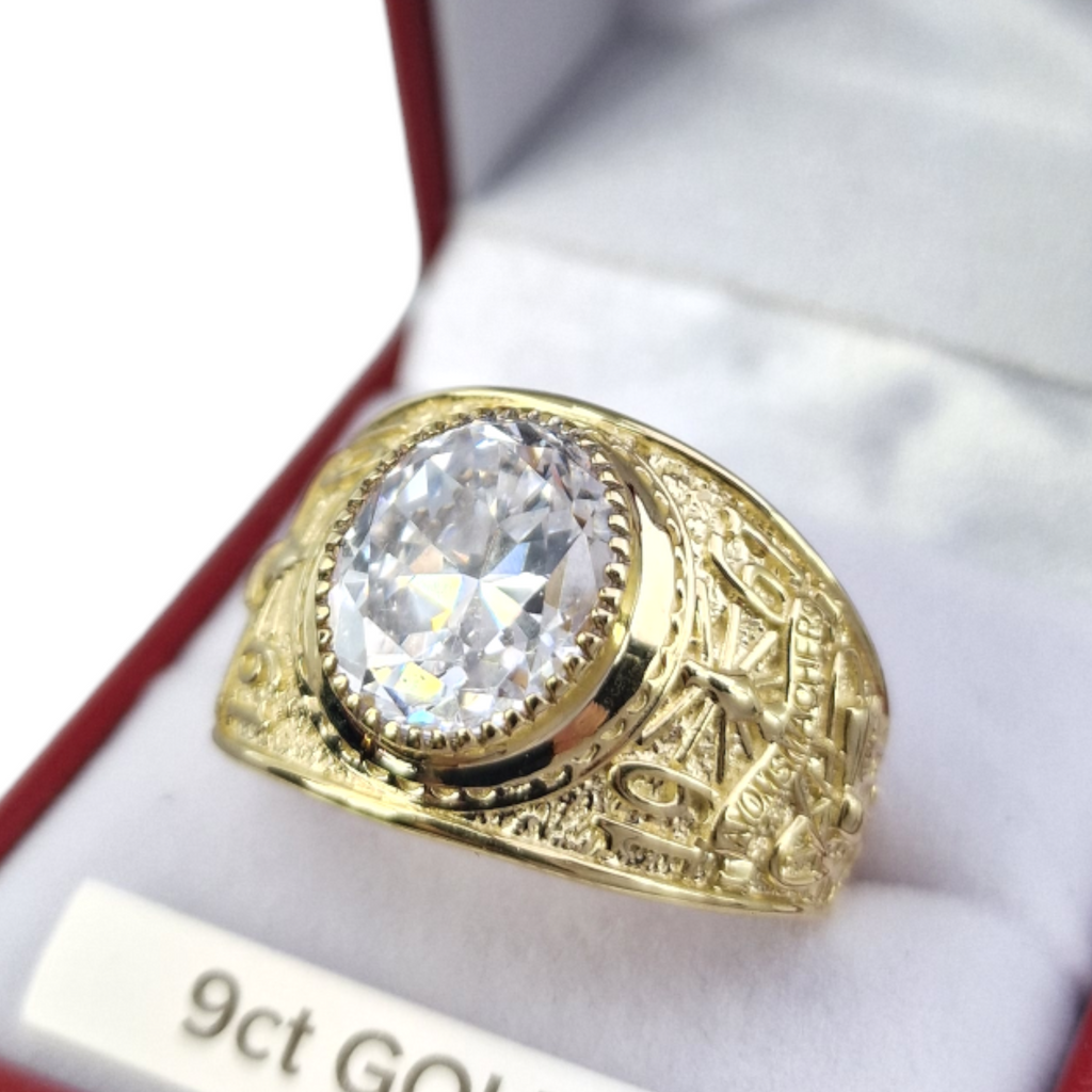 College ring with white stone set in 9ct yellow gold, pictured inna red gleesons jewellers box