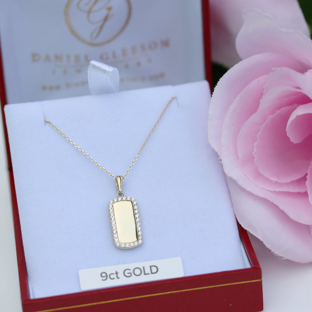 Front view of 9ct gold pendant and chain with sparkling border, engravable disc centrepiece.