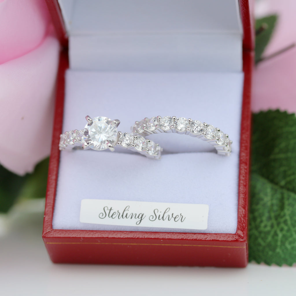 Front view of Helena sterling silver bridal set with sparkling round centre stone and pavé-set bands from gleeson jewellers.