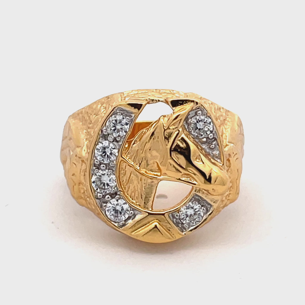 Overhead view of sterling silver gold-plated horseshoe head ring with cubic zirconia from Gleeson Jewellers.