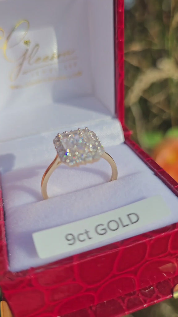 9ct Gold Ladies rectangular cubic zirconia dress ring in a red Gleeson jewellers Cork box. 