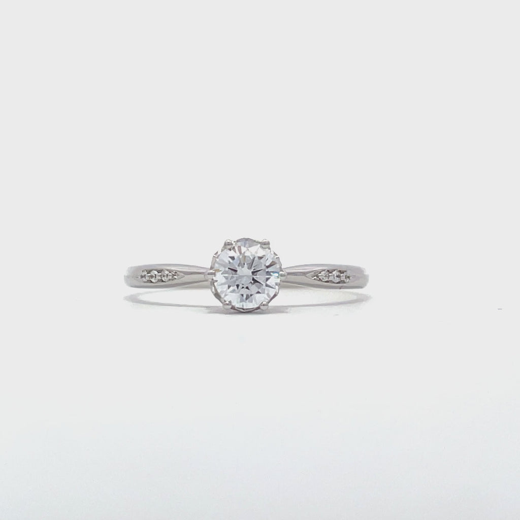 9ct white gold dainty solitaire ring showing centre stone setting
