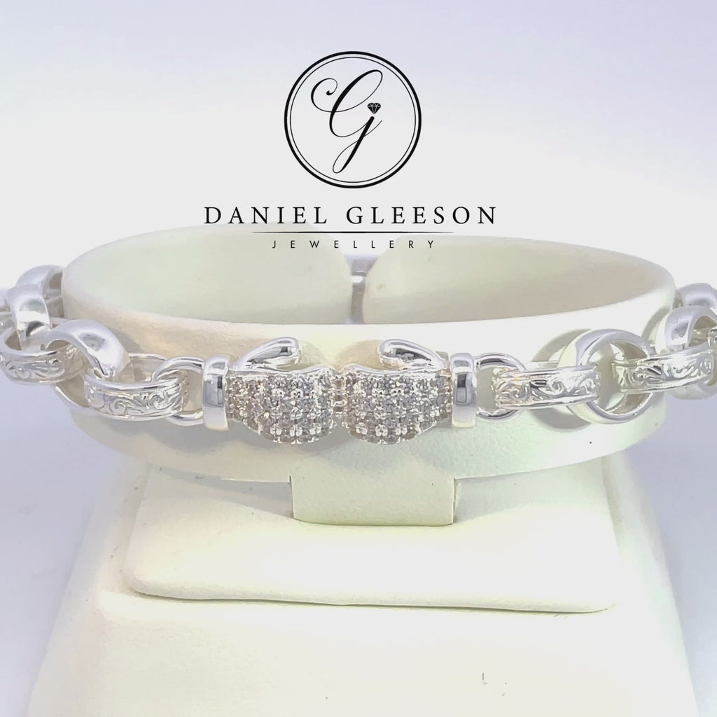 kids double boxing glove bracelet in sterling silver with double cubic zirconia gloves in the centre from daniel gleeson jewellers in cork 