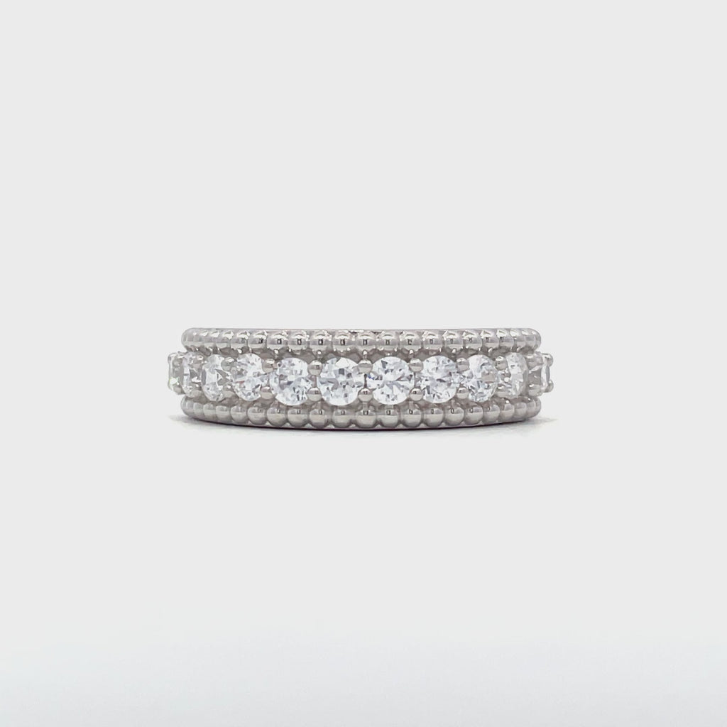 9ct white gold mill grain eternity ring showing stone set band