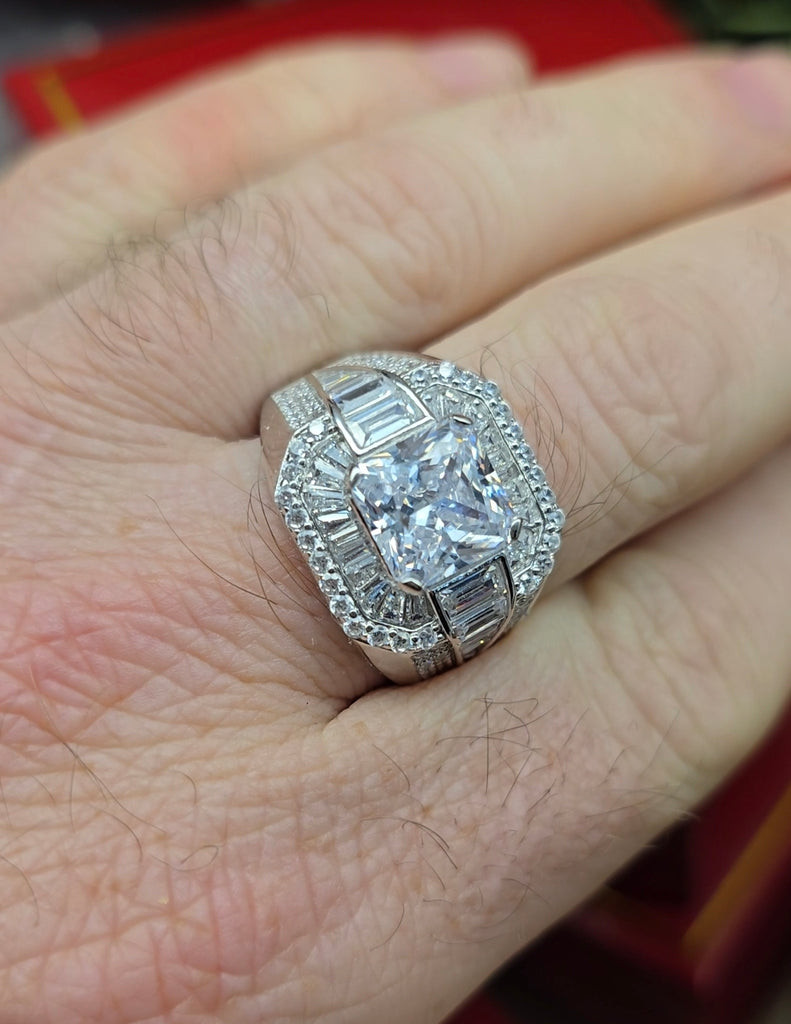 Men’s large Sterling Silver ‘Arcline’ dress ring with square-cut centre stone shown worn on hand, from Gleeson Jewellers.