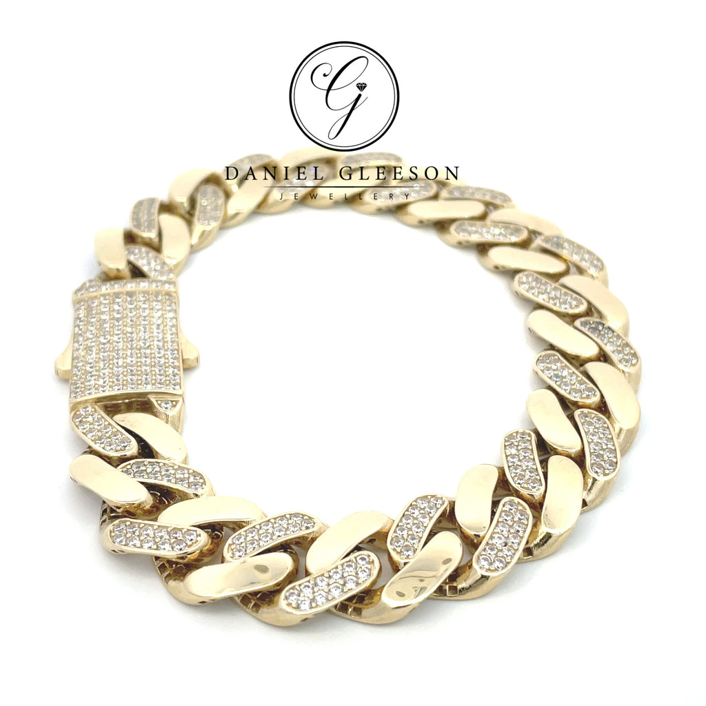 mens gold curb bracelet with cz encrusted fancy clasp lying flat from Daniel Gleeson Jewellers in Cork 